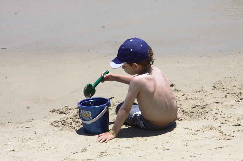 Criança na praia